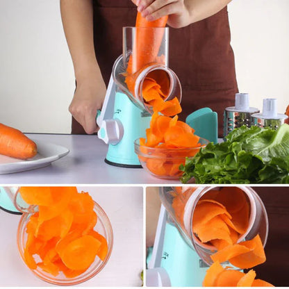 Ralador multifuncional manual ralando cenoura, legumes fatiados em tigela de vidro, folhas verdes ao lado