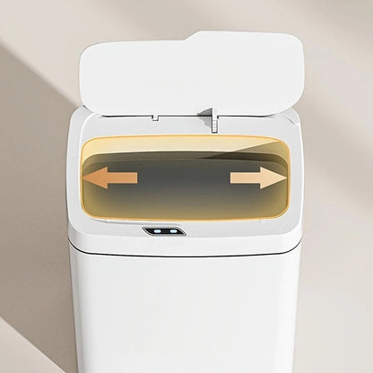Lixeira automática branca com tampa aberta e sensor, destacando indicação de movimento das mãos para abrir