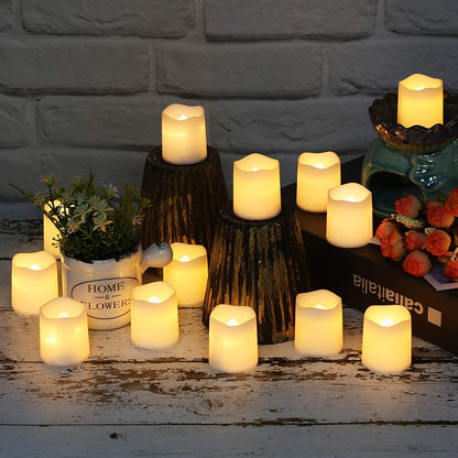 Velas LED decorativas acesas em mesa rústica com plantas e flores artificiais