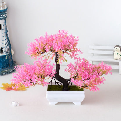 Bonsai artificial com flores cor-de-rosa em vaso branco, decoração de mesa minimalista