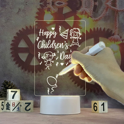 Mão desenhando mensagem Happy Children's Day em painel luminoso com engrenagens e cubos de madeira ao fundo