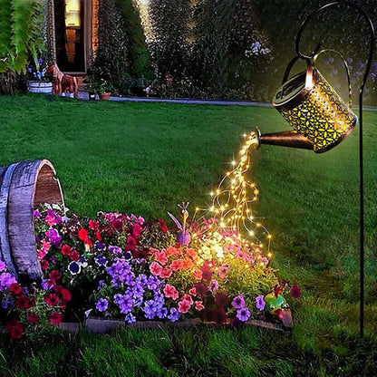 Jardim noturno com flores coloridas, regador decorativo iluminado com luzes de LED