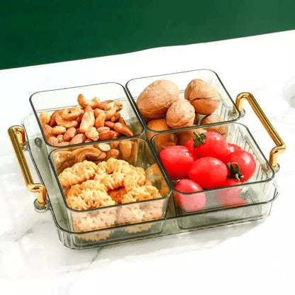 Bandeja multifuncional com alças douradas e quatro potes organizadores de vidro contendo castanhas, nozes, biscoitos e tomates