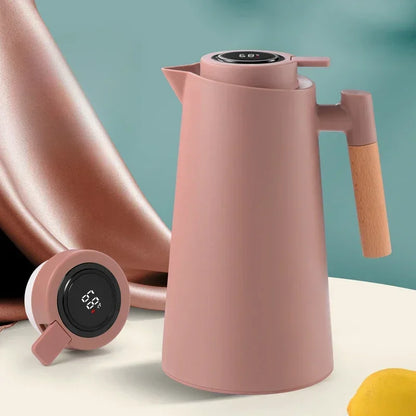 Garrafa térmica rosa com termômetro digital no cabo de madeira, ideal para café e chá