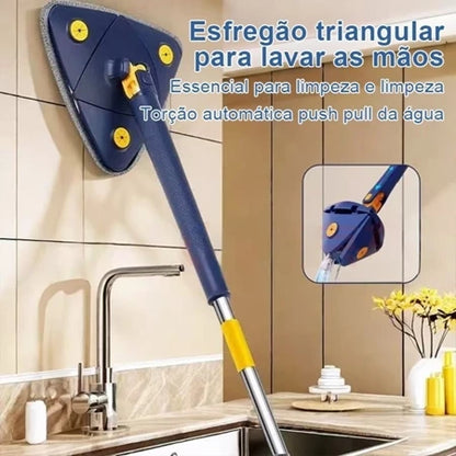 Esfregão triangular azul para lavar as mãos com torção automática em pia de cozinha com torneira e flores amarelas